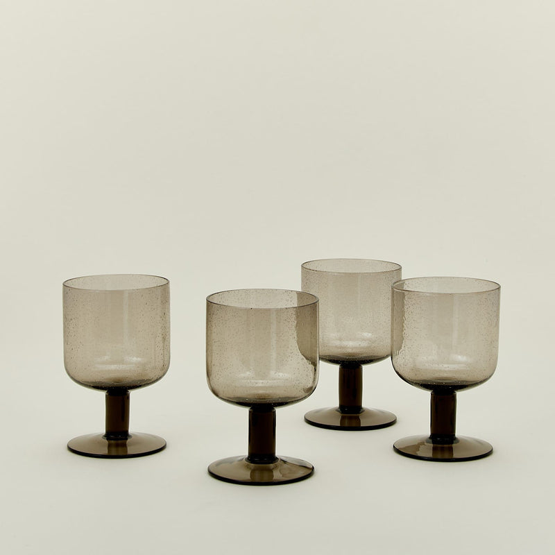 Set of four simple seeded stemware in blue.